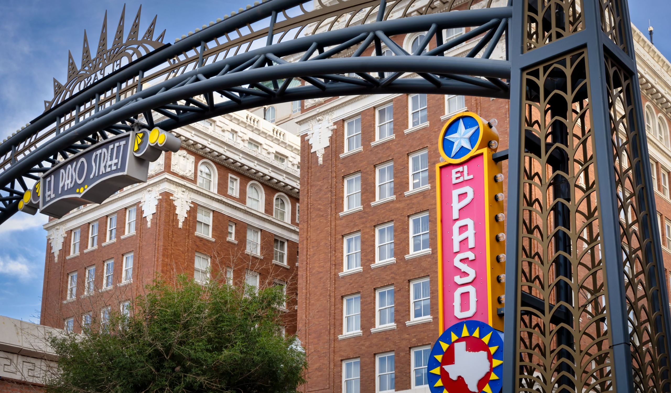 Downtown El Paso street with the El Paso sign and historic buildings