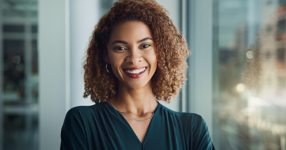Smiling woman with curly hair