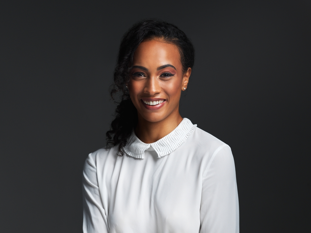 Smiling woman in a white blouse